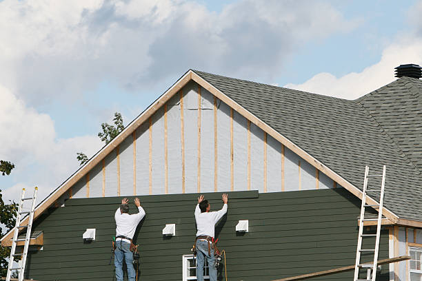 Professional Emergency Siding Repair technician working in Sanford, CO